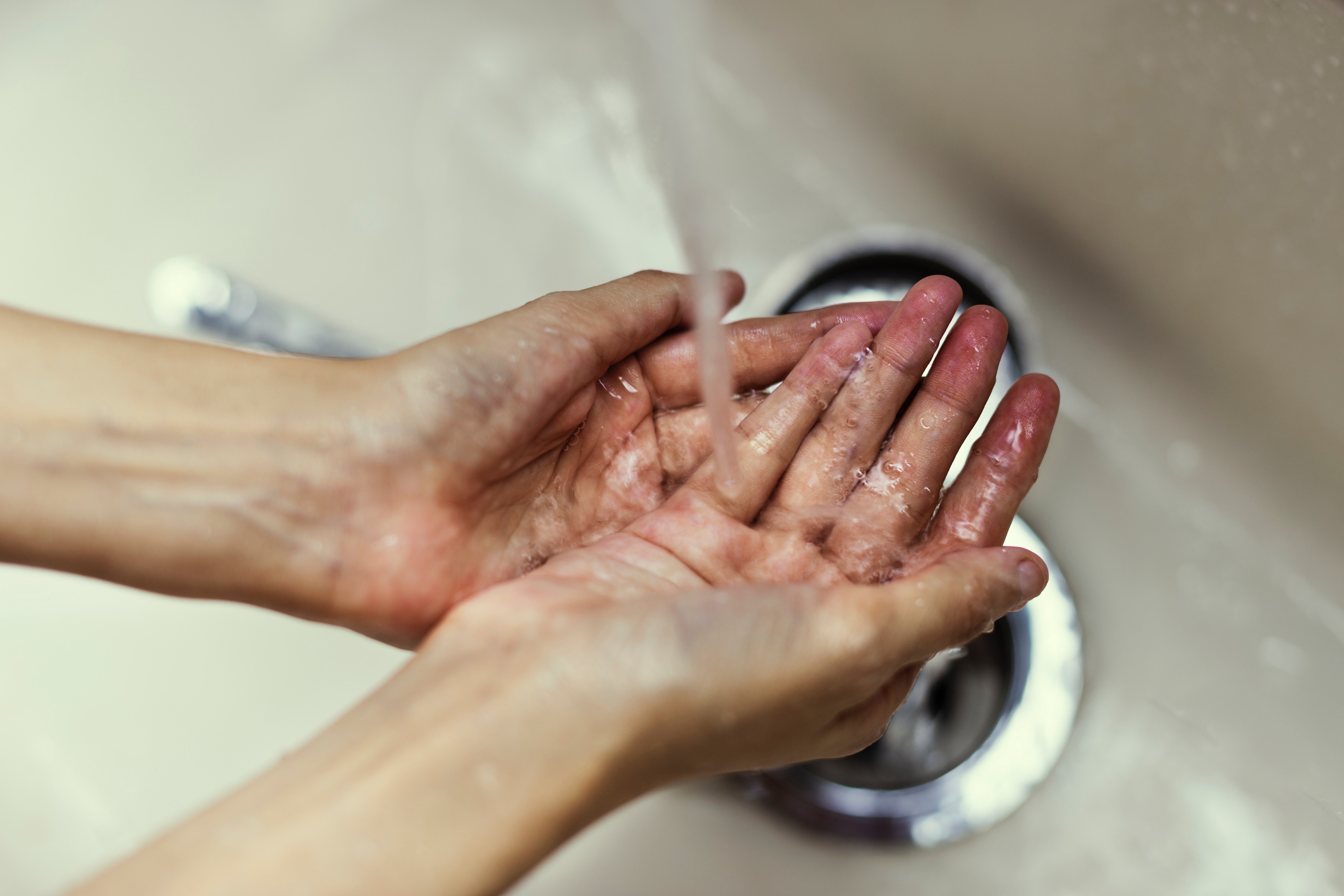 rinse hands with water